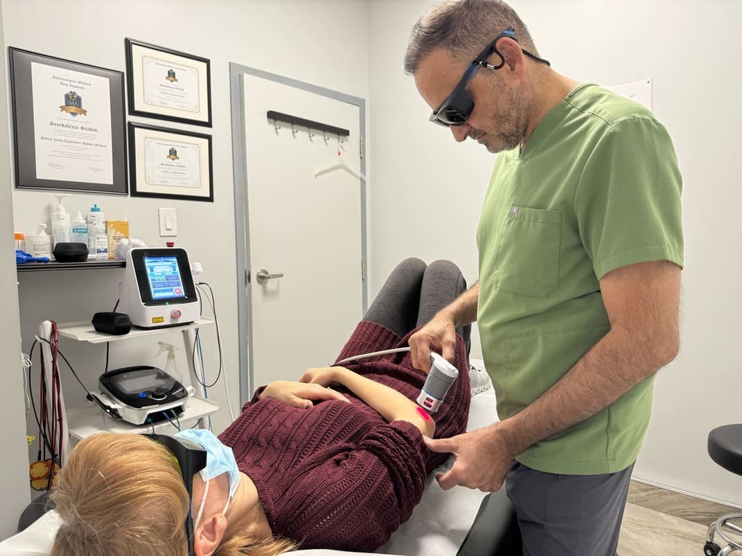Class IV Laser Therapy applied to the lower back for sciatica at York Rehab Clinic